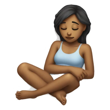 A girl laying down holding her stomach with a sad face sticker