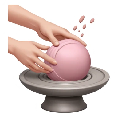 one hand throwing a pink ball of clay onto a flat silver pottery wheel surface sticker
