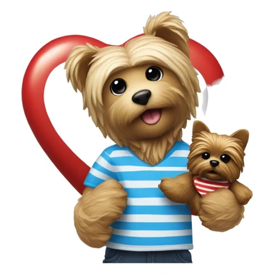 Bear toy with white and blue stripped shirt and redheart in the middle being held next to a yorkie dog sticker