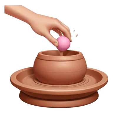 one hand throwing a pink ball of clay onto a pottery wheel sticker