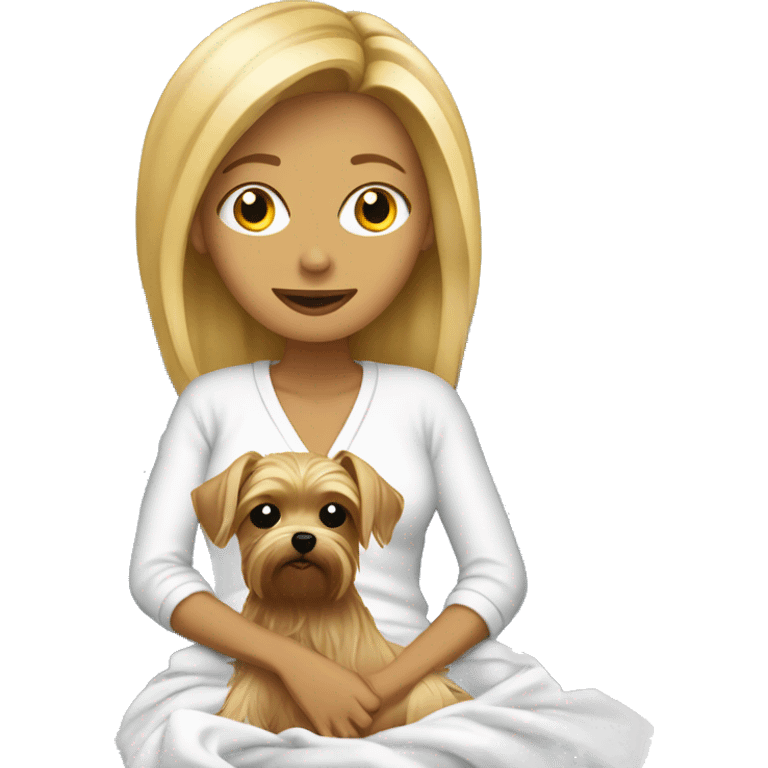 Blonde woman sitting on sofa with Yorkie covered in her sheets emoji