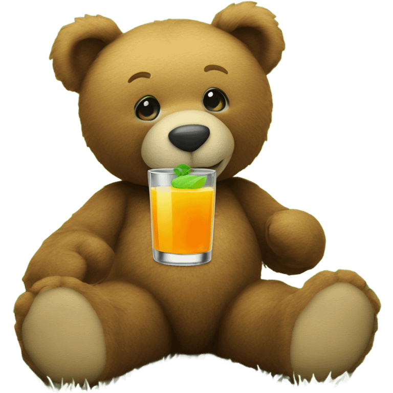 A Teddy bear holding a glass of juice sitting on a patch of green grass emoji