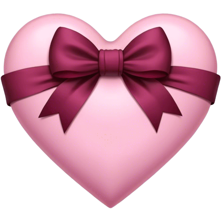 Pink heart with a burgundy bow in the middle emoji