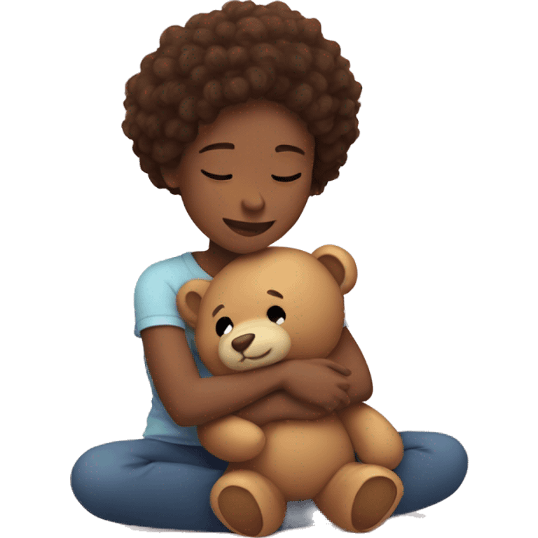 Girl cuddling her teddy emoji