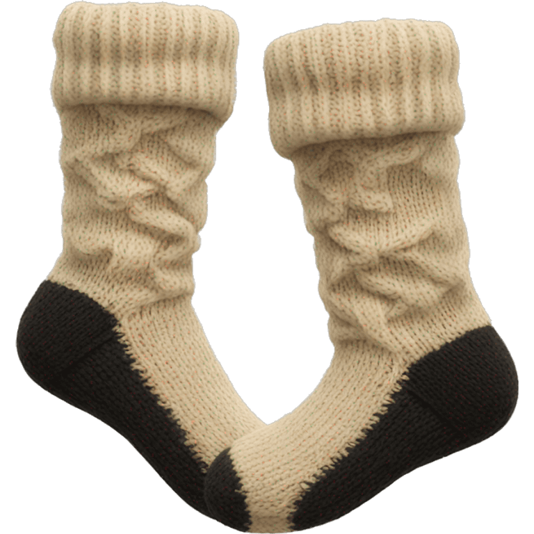 Pair of beige knitted socks black emoji