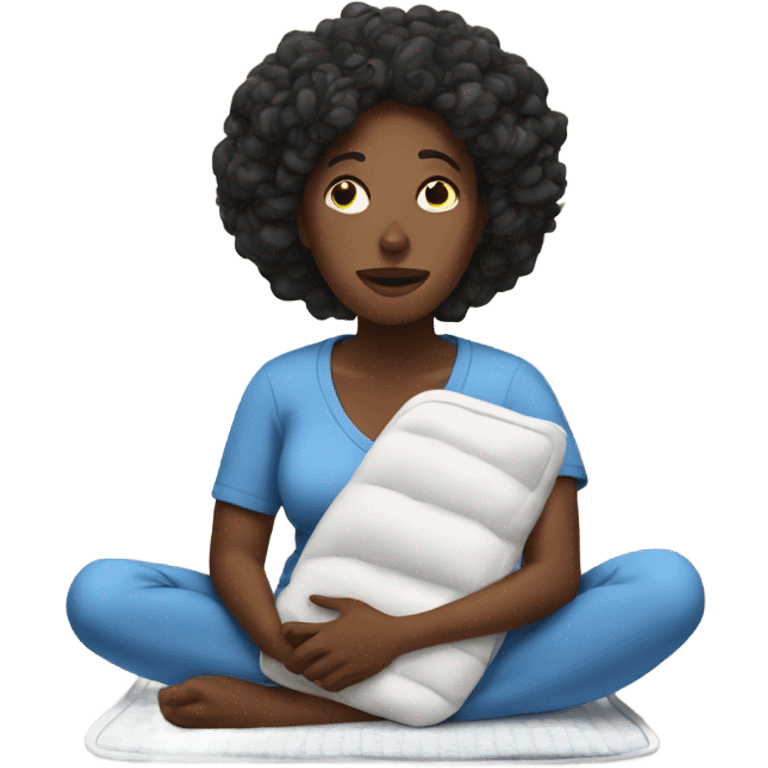 black mom in pain holding heating pad with cord emoji