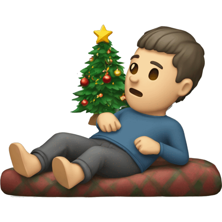 man laying under christmas tree emoji