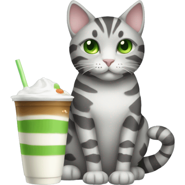 A striped grey cat with green eyes drinking boba emoji