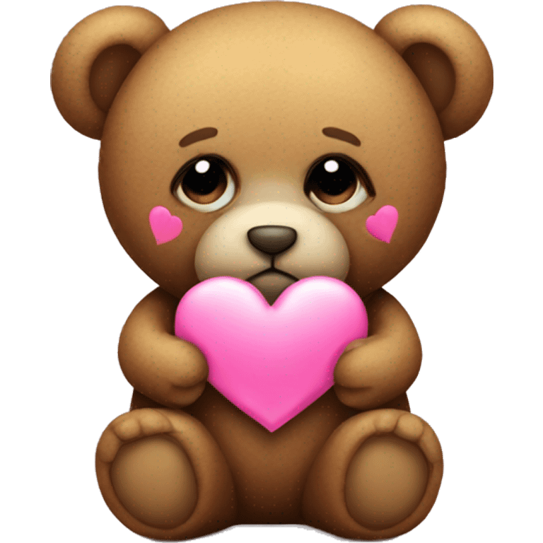 Teddy bear with sad eyes holding a pink heart emoji