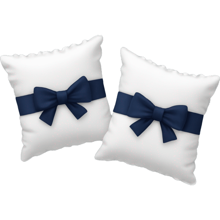 2 white pillows with ruffles and a navy blue bow emoji