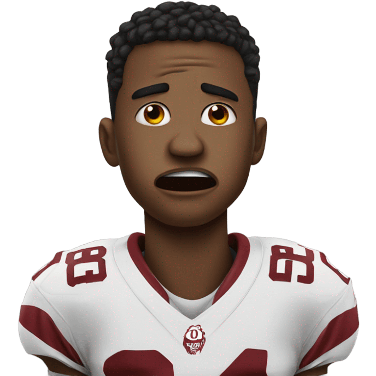 OU football player crying tears emoji