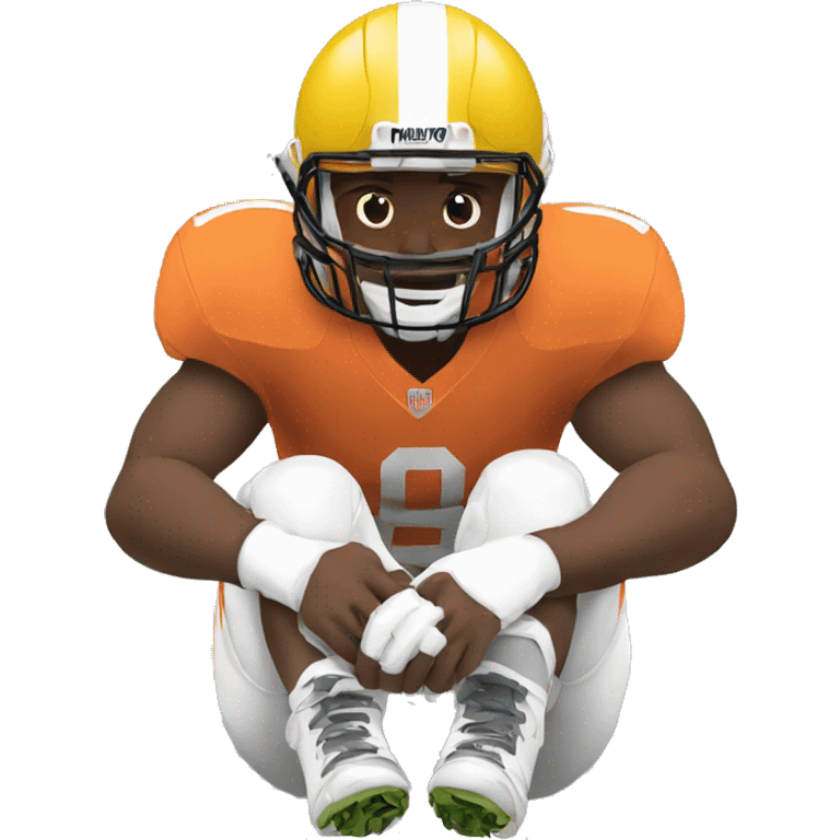 football player sitting down holding his knee emoji