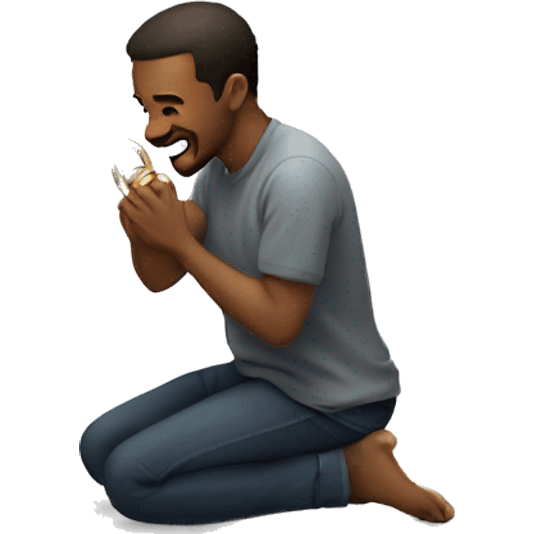 Man on one knee on the floor while holding a ring in  emoji