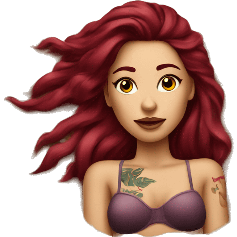 Beautiful tattooed burgundy long haired woman laying on the beach emoji