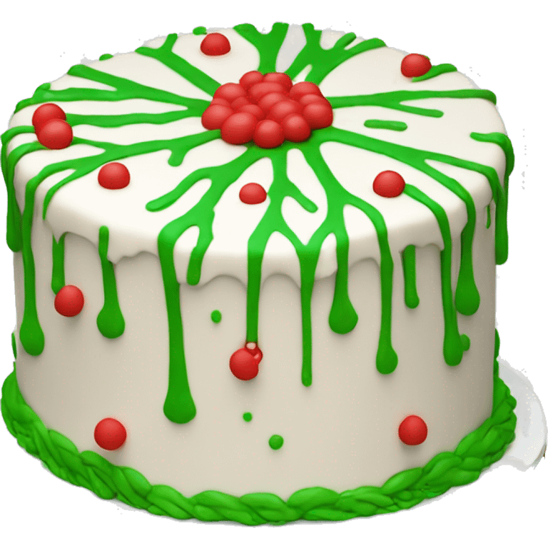 White tree shaped cake drizzled with red icing with tiny green sprinkles emoji