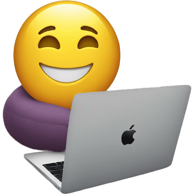 Working on a mac book sitting on a bean bag emoji