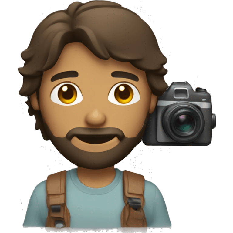 brown guy with mullet and beard holding a photo camera emoji